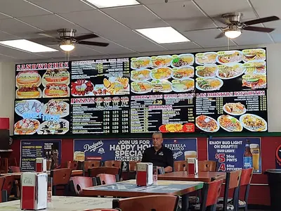 Los Monitos Tacos and Corinas Pizza