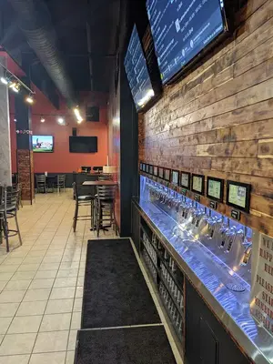 Twisted Tomato Pizzeria & Beer Wall
